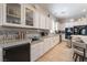 Kitchen with white cabinets, granite countertops, and stainless steel appliances at 10579 Garden Rose Dr, Las Vegas, NV 89135