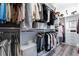 A well-organized walk-in closet with shelving, hanging racks and room for storing accessories at 10579 Garden Rose Dr, Las Vegas, NV 89135