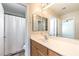 Functional bathroom featuring a single vanity, mirror, and shower/tub combination at 10636 Colter Bay Ct, Las Vegas, NV 89129