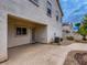Backyard view with covered patio and desert landscaping at 1115 Aldenwood Ave, Las Vegas, NV 89123
