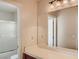 Secondary bathroom featuring a vanity, toilet, mirror, and shower at 1115 Aldenwood Ave, Las Vegas, NV 89123