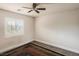 Comfortable bedroom with carpet and a window offering natural light at 1115 Aldenwood Ave, Las Vegas, NV 89123