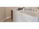 Functional laundry room with washer and dryer at 1115 Aldenwood Ave, Las Vegas, NV 89123
