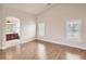 Spacious main bedroom with hardwood floors and natural light from plantation-shuttered windows at 1115 Aldenwood Ave, Las Vegas, NV 89123