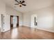 Large main bedroom with hardwood flooring, a ceiling fan, and natural light at 1115 Aldenwood Ave, Las Vegas, NV 89123