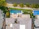 Aerial view of backyard with pool, putting green, and outdoor seating area at 11152 San Terrazo Pl, Las Vegas, NV 89141
