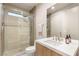 Modern bathroom featuring a glass enclosed shower, and a single sink vanity at 11152 San Terrazo Pl, Las Vegas, NV 89141