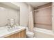 Well lit bathroom featuring a tub with shower and a single sink vanity at 11152 San Terrazo Pl, Las Vegas, NV 89141