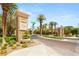 Entrance to the Cliffs community featuring lush landscaping and signage at 11152 San Terrazo Pl, Las Vegas, NV 89141