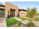 Beautiful home featuring a stone accent wall, modern design, and manicured landscaping at 11152 San Terrazo Pl, Las Vegas, NV 89141