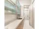 Walk-in pantry features custom shelving, ample storage, and a sleek design at 11152 San Terrazo Pl, Las Vegas, NV 89141