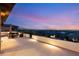 Spacious rooftop deck with comfortable seating and panoramic city and mountain views at 11152 San Terrazo Pl, Las Vegas, NV 89141