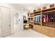 Elegant closet area with a desk, shelving, drawers, and closet space for clothing and accessories at 11152 San Terrazo Pl, Las Vegas, NV 89141