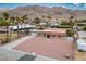 A desert home situated on a large lot with desert landscaping and mature trees, with mountain views at 138 Palma Del Rio, Las Vegas, NV 89110