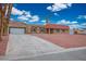 Charming single-story home featuring a desert landscape, an attached garage, and mountain views at 138 Palma Del Rio, Las Vegas, NV 89110