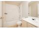 Bathroom with tub and shower combination and neutral colors at 1617 Cave Spring Dr, Henderson, NV 89014
