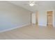 Open main bedroom with an ensuite bathroom and neutral walls at 1617 Cave Spring Dr, Henderson, NV 89014