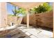 Private patio area with block wall, concrete flooring, and covered pergola at 1617 Cave Spring Dr, Henderson, NV 89014