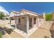 This home features a covered patio and low-maintenance desert landscaping at 1705 Imperial Cup Dr, Las Vegas, NV 89117