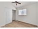 Bedroom with vaulted ceiling, hardwood floors, a closet, and natural light at 1705 Imperial Cup Dr, Las Vegas, NV 89117