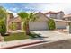 Charming two-story home with desert landscaping and a two-car garage at 1705 Imperial Cup Dr, Las Vegas, NV 89117