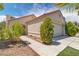 Charming single-story home with desert landscaping and a two-car garage at 1705 Imperial Cup Dr, Las Vegas, NV 89117
