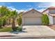 Beautiful two-story home with desert landscaping and a two-car garage at 1705 Imperial Cup Dr, Las Vegas, NV 89117
