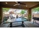 Covered back patio featuring an outdoor kitchen and seating area at 2198 Maderno St, Henderson, NV 89044
