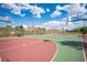 Outdoor basketball court with hoops, surrounded by a fence at 2198 Maderno St, Henderson, NV 89044