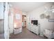bedroom with gray dresser and a pink flower wall at 2198 Maderno St, Henderson, NV 89044