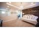 Second floor bedroom with decorative wood accent wall and white daybed at 2198 Maderno St, Henderson, NV 89044