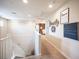 Upstairs hallway featuring modern decor and access to multiple rooms at 2198 Maderno St, Henderson, NV 89044