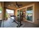 Covered patio with ceiling fan and large sliding glass doors at 2198 Maderno St, Henderson, NV 89044