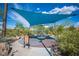 Community playground with sun shade, play equipment, and seating at 2198 Maderno St, Henderson, NV 89044