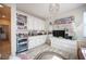 Room featuring a wet bar, custom shelving, and fun decorations at 2198 Maderno St, Henderson, NV 89044
