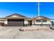 Charming single-story home with a well-maintained front yard and attached garage at 2368 Winterwood Blvd, Las Vegas, NV 89142