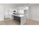 Updated kitchen featuring white cabinets, granite countertops, and stainless steel appliances at 2368 Winterwood Blvd, Las Vegas, NV 89142