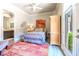 Inviting bedroom featuring a stylish bed, a large closet, and access to the backyard at 2539 Turtle Head Peak Dr, Las Vegas, NV 89135