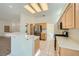 Spacious kitchen featuring stainless steel appliances, tile flooring, and open layout at 2601 Deer Lake St, Las Vegas, NV 89134