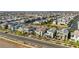 An elevated view showcasing a vibrant community with modern architecture and well-maintained landscaping at 2710 Marchetti Pl, Henderson, NV 89044