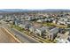 Expansive aerial shot of a residential community nestled against a desert landscape with mountain views at 2710 Marchetti Pl, Henderson, NV 89044