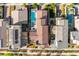 Aerial view of homes with tile roofs featuring pools and landscaped backyards in close proximity to neighbors at 2710 Marchetti Pl, Henderson, NV 89044