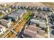 An aerial view of a planned residential community with sidewalks, common area, and modern homes at 2710 Marchetti Pl, Henderson, NV 89044