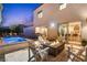 Outdoor space with a pool, fire pit, patio area, and a built-in grill, perfect for entertaining at 2710 Marchetti Pl, Henderson, NV 89044