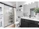 Tastefully designed bathroom featuring a glass-enclosed shower and vanity with modern accents at 2710 Marchetti Pl, Henderson, NV 89044