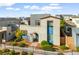 Charming home with unique architectural details, a well-kept garden, and a welcoming entrance at 2710 Marchetti Pl, Henderson, NV 89044