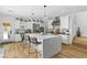 Bright open kitchen featuring a large island, modern appliances, and ample counter space at 2710 Marchetti Pl, Henderson, NV 89044