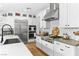 Modern kitchen featuring stainless steel appliances, ample cabinetry, and stylish countertops at 2710 Marchetti Pl, Henderson, NV 89044