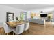 Bright living room featuring an open concept, natural light, and modern decor at 2710 Marchetti Pl, Henderson, NV 89044