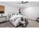 Cozy main bedroom featuring a plush bed, elegant furnishings, and soft lighting, creating a tranquil atmosphere at 2710 Marchetti Pl, Henderson, NV 89044